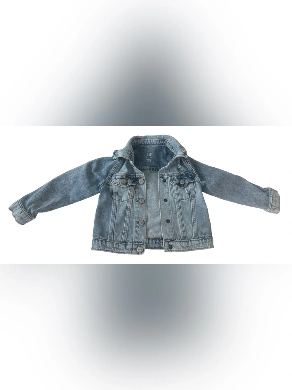 Gap girl’s Icon Denim Jacket. with distressed detailing at the chest.  Size 4T.